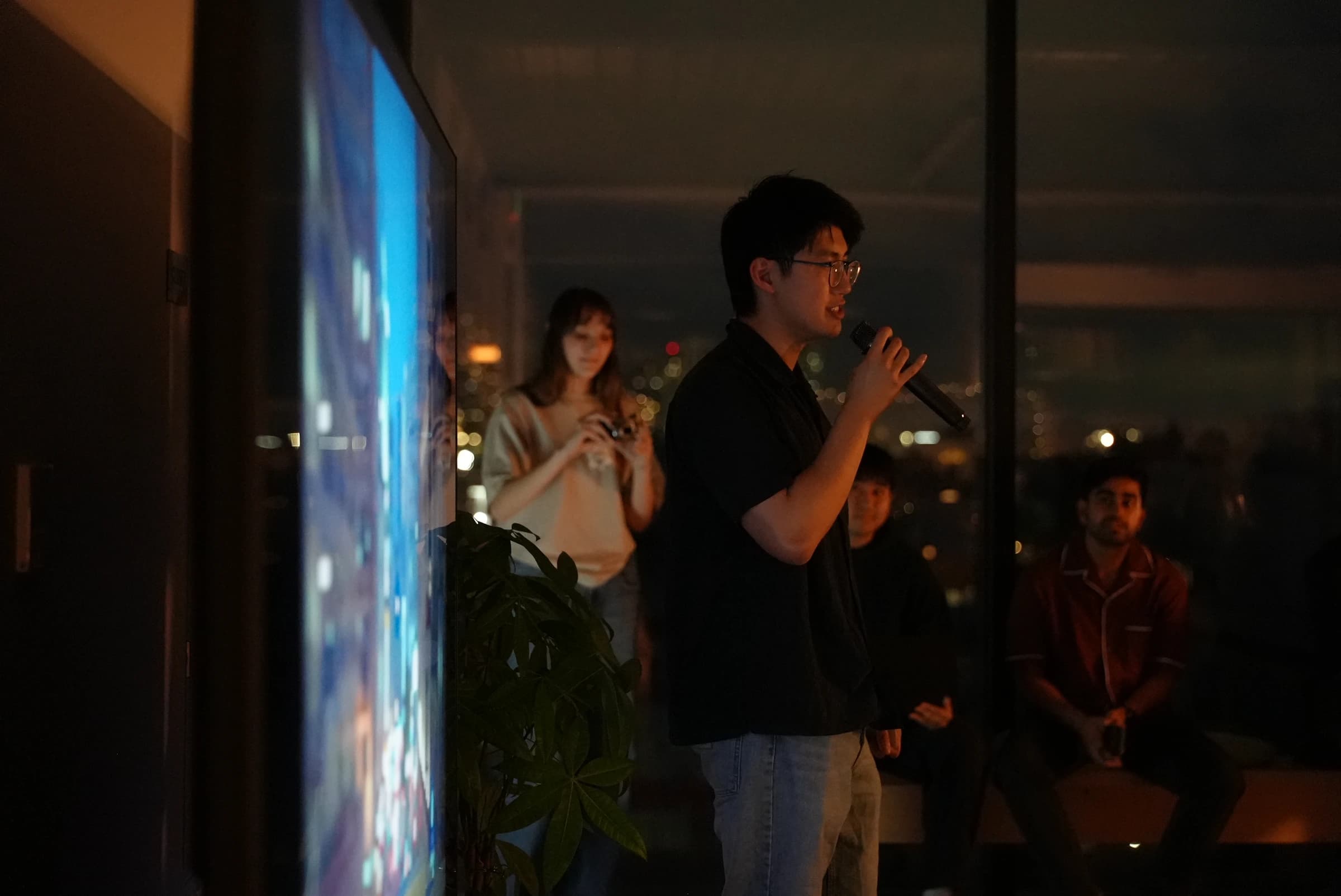 Team member speaking at an event