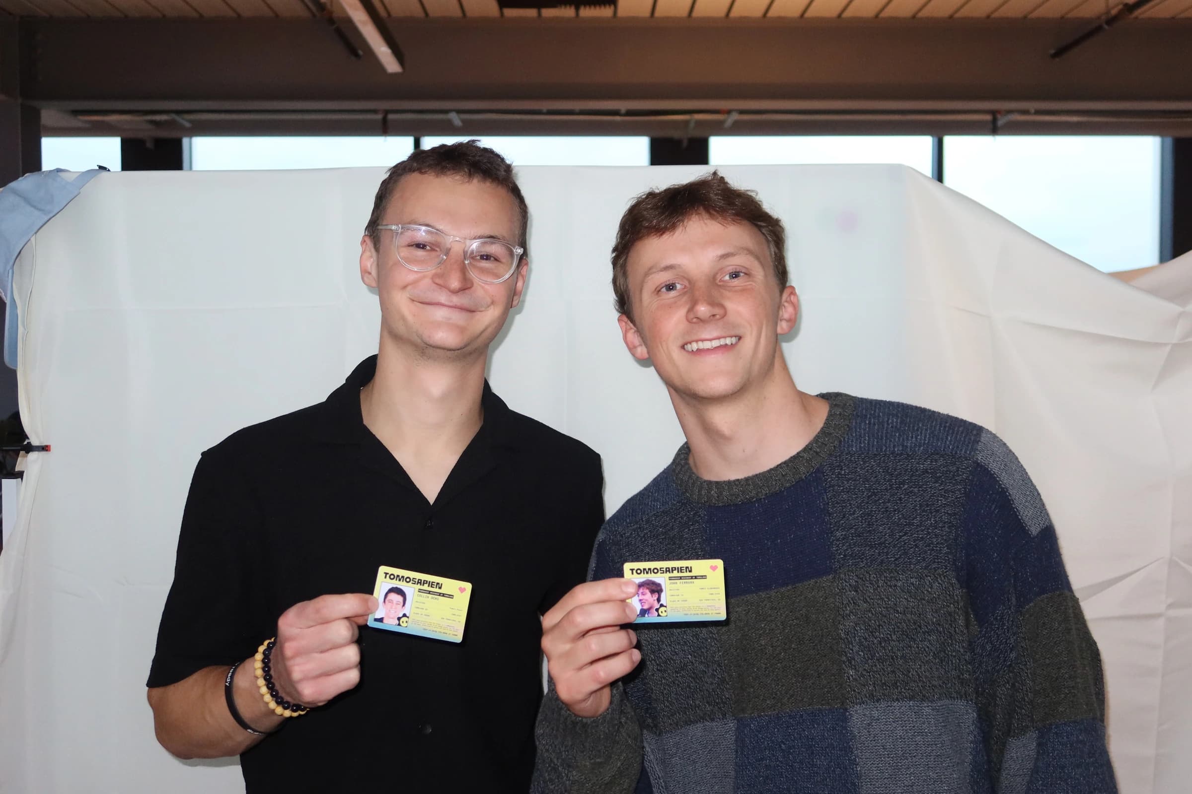 Team members with Tomosapien cards